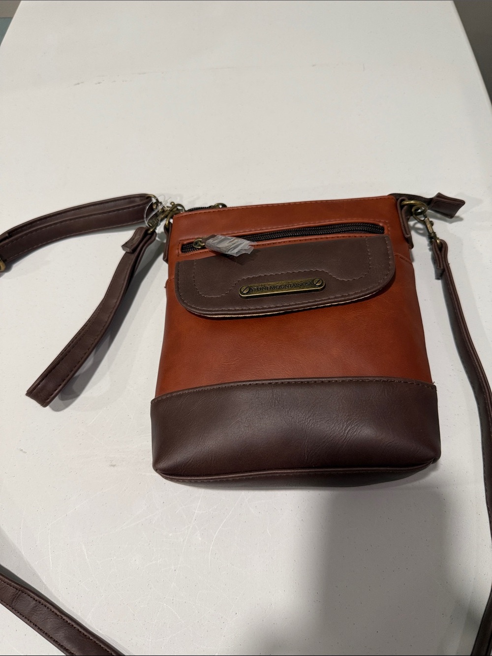 Stone Mountain Accessories Brown and Tan Crossbody Bag